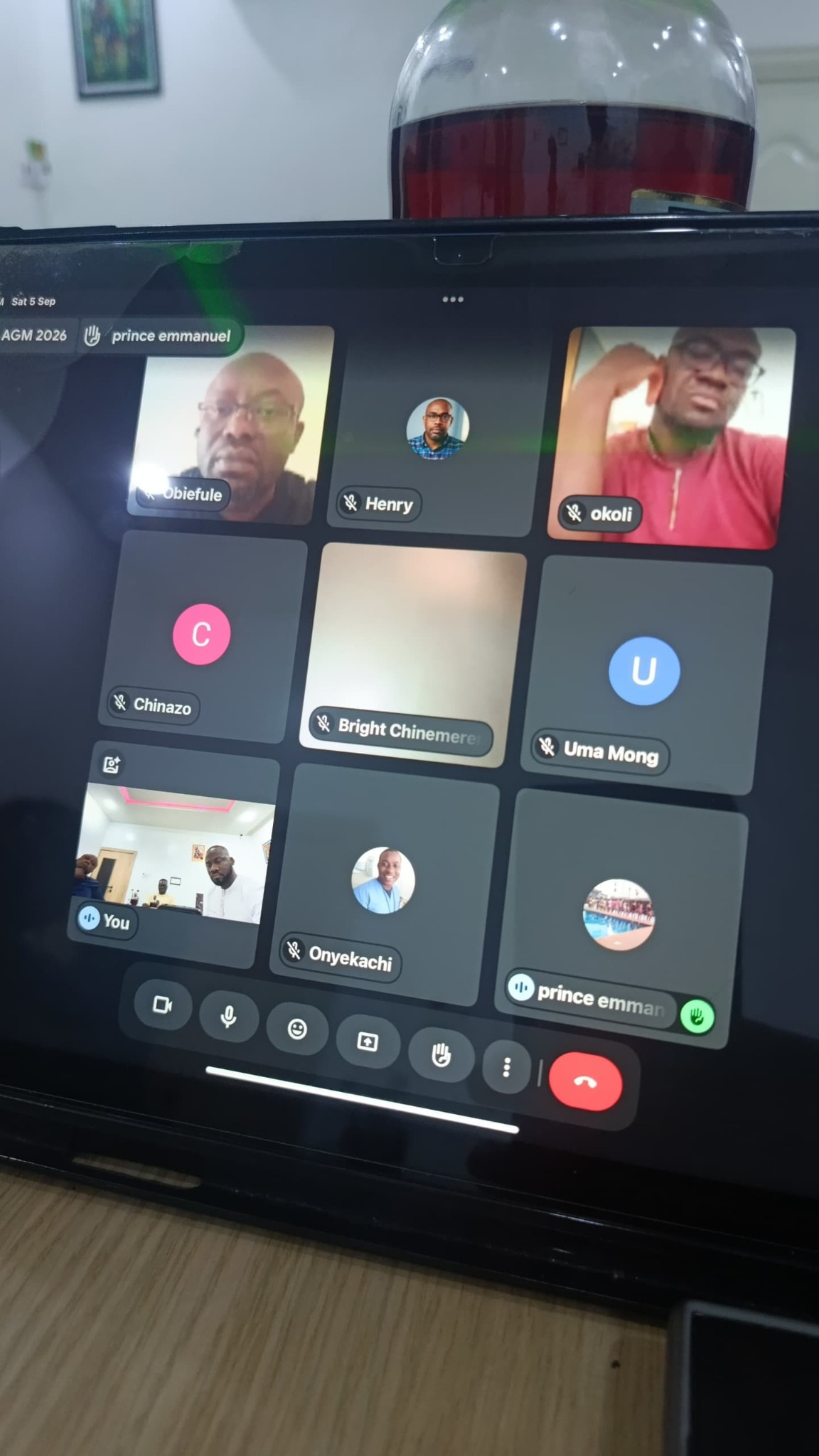 A PHF virtual meeting shown on a tablet screen